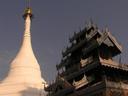 A brilliant white stupa stands on the hill over Mae Hong Son.